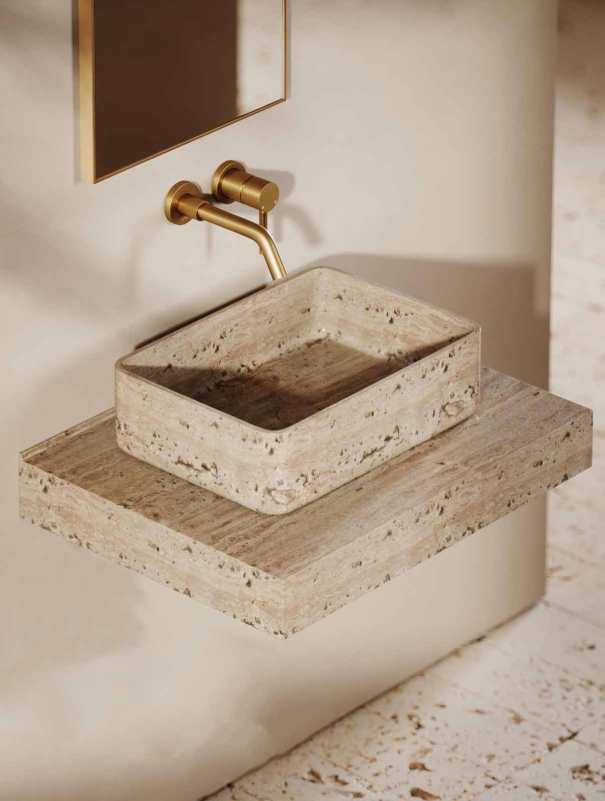 Beige travertine sink with elegant natural veining and honed finish